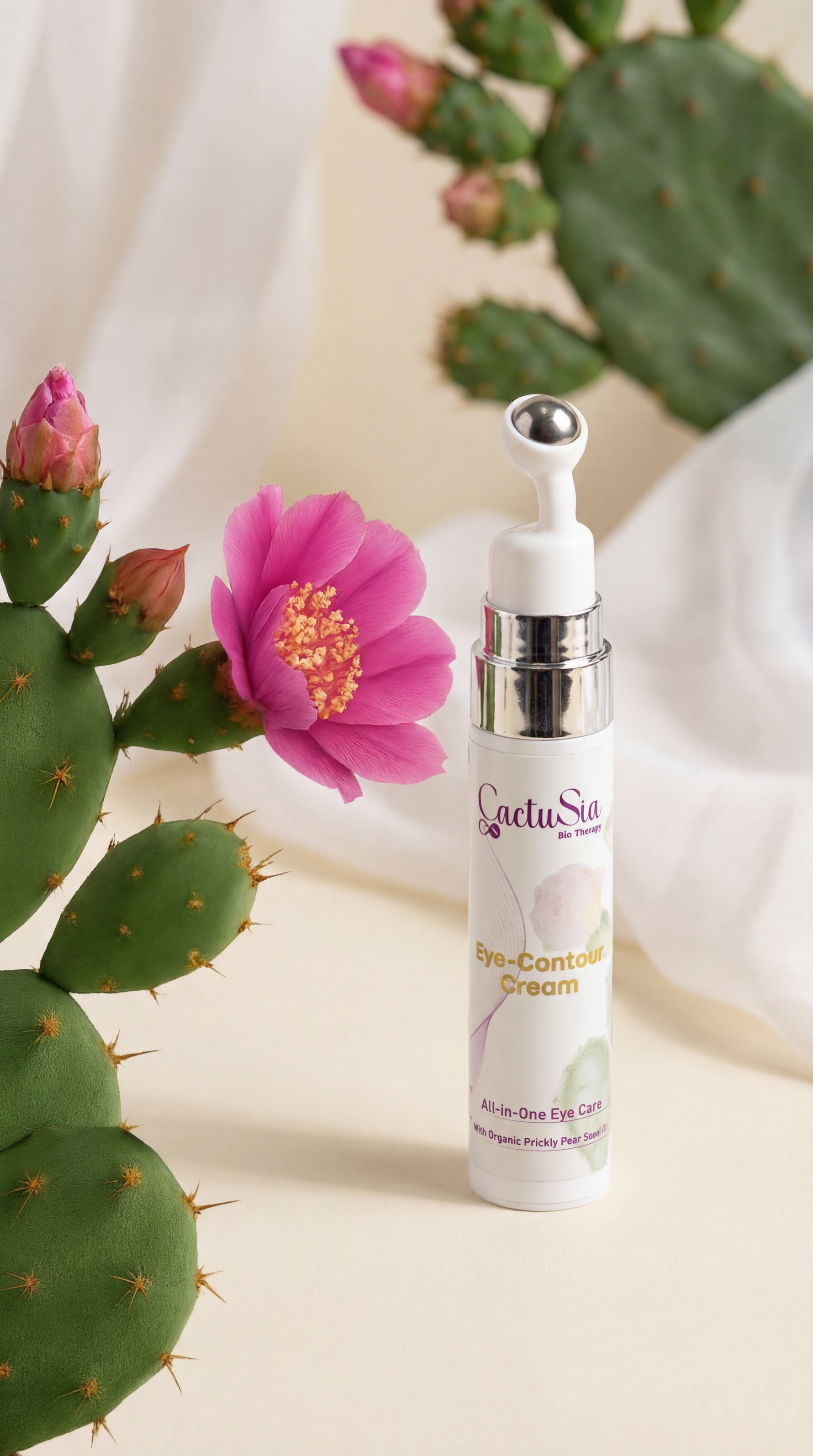 Skincare bottle with cactus and pink flower on a light background