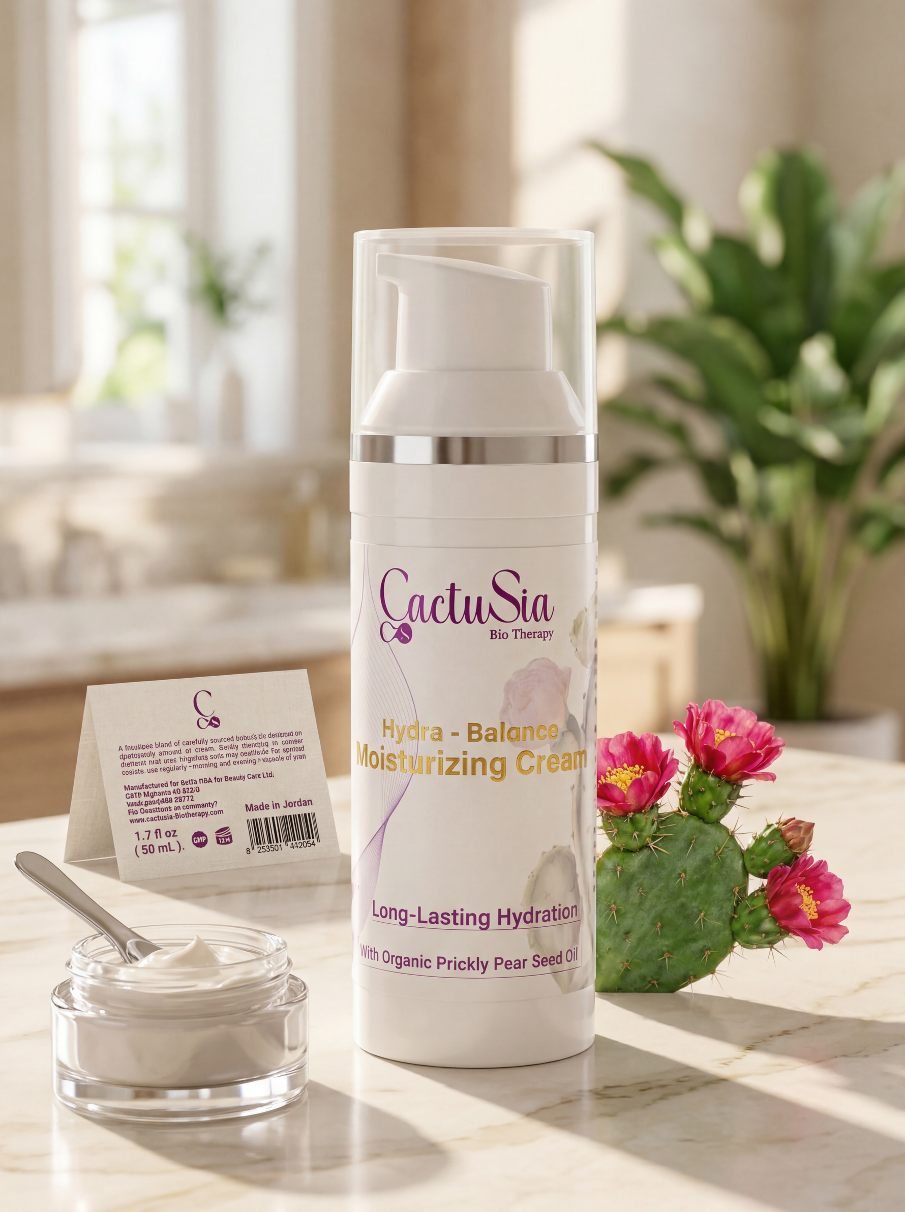 Cactusia moisturizing cream bottle on a table with cactus and flowers in the background